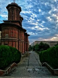 Built structure against cloudy sky