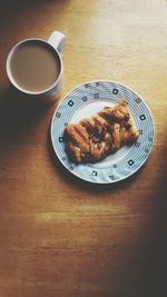 Close-up of coffee cup on table