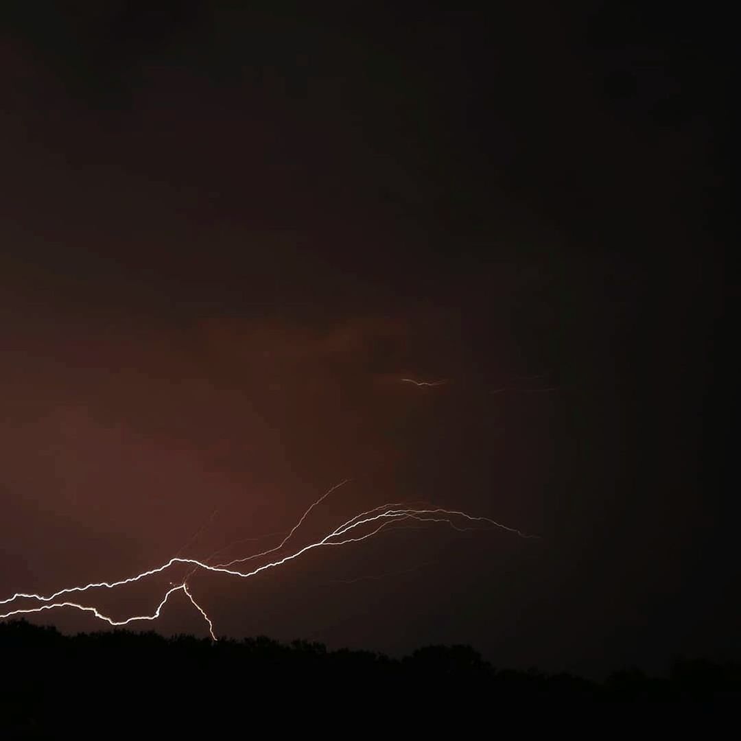 lightning, power in nature, storm, thunderstorm, beauty in nature, cloud, night, sky, thunder, forked lightning, electricity, warning sign, no people, communication, sign, nature, environment, darkness, outdoors, illuminated, dramatic sky, storm cloud, dark, copy space, scenics - nature, light - natural phenomenon