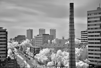 Buildings in city against sky