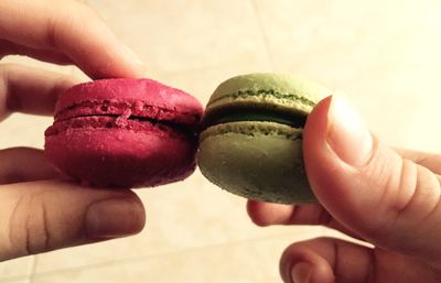 Close-up of hand holding ice cream