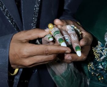 Close-up of woman holding hands