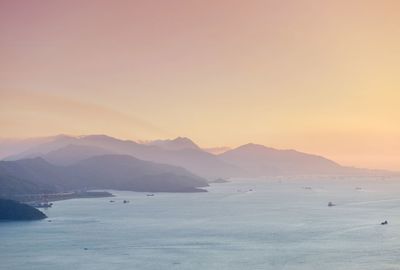 Scenic view of sea against sky at sunset