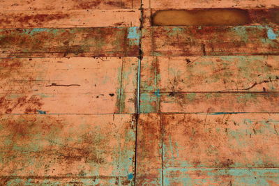 Metal flooring that has been exposed to weather conditions that have changed for a long time to rust