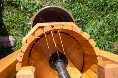 Close up high angle view of apple cider press