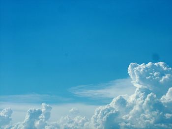 Low angle view of cloudscape against blue sky