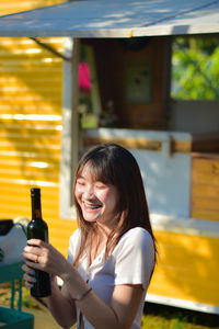 Young woman using mobile phone