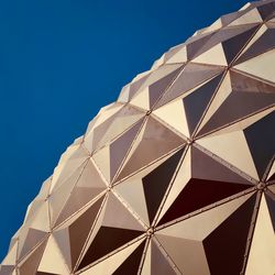 Low angle view of built structure against blue sky