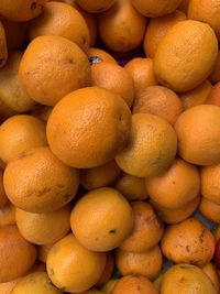 Full frame shot of oranges at market stall