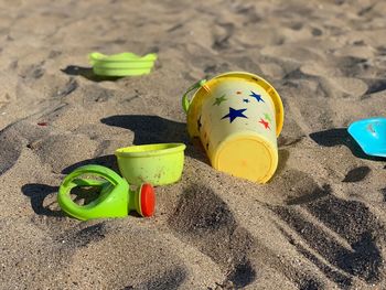 High angle view of toy on sand