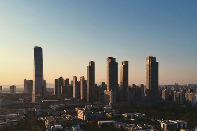 View of cityscape against sky during sunset