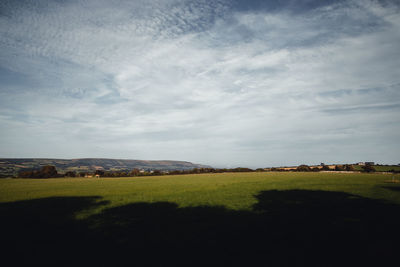 Scenic view of field against sky