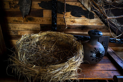 High angle view of eggs in nest on table