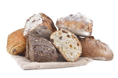 Close-up of bread against white background