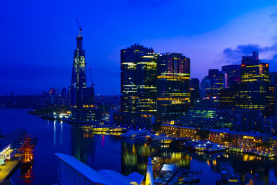 Illuminated buildings in city at night