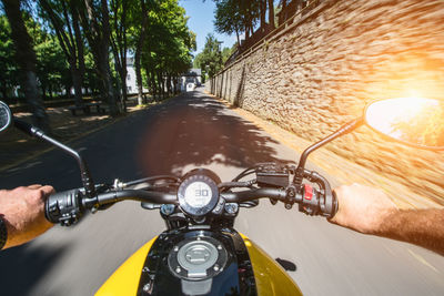 Man riding bicycle on road