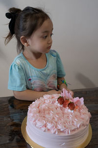 Asian cute little princess at 3rd birthday party.