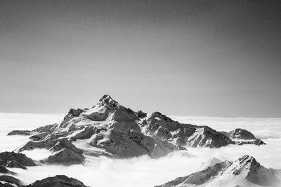 Scenic view of snowcapped mountains against clear sky