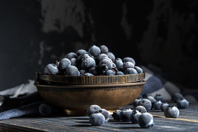Close-up of fruits in bowl on table
