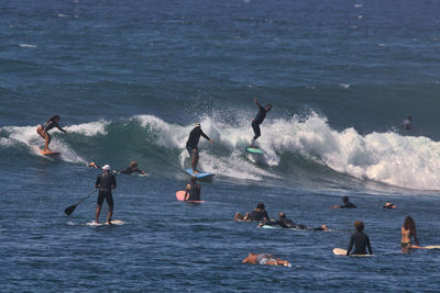 People enjoying at beach