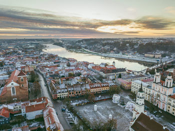 High angle view of cityscape against sky during sunset