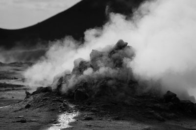 Smoke emitting from volcanic mountain