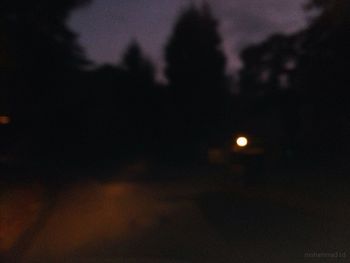 Low angle view of illuminated building at night