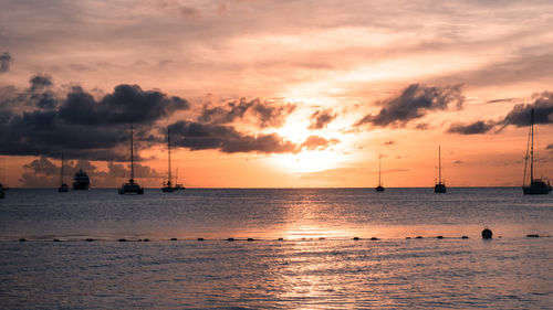 Scenic view of sea against sky at sunset