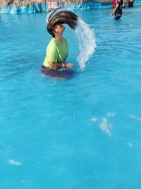 Woman swimming in pool