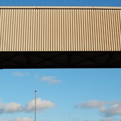 Low angle view of built structure against blue sky