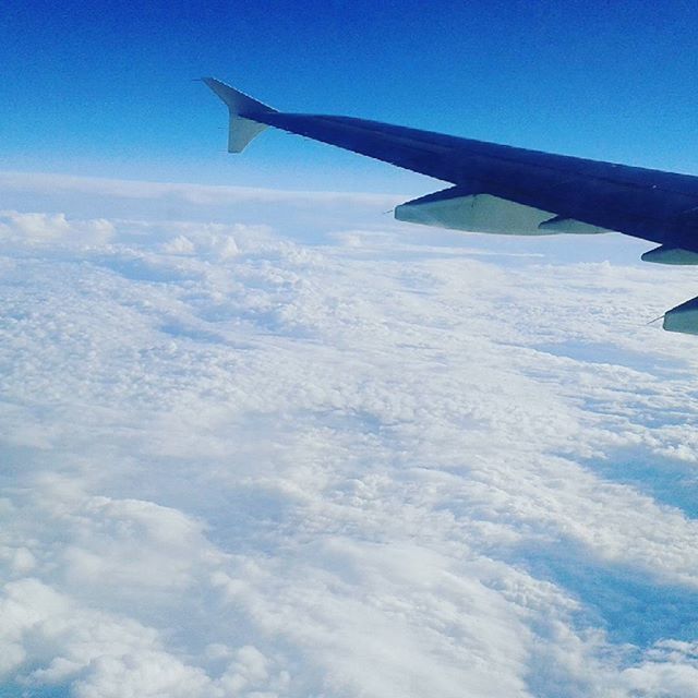 airplane, aircraft wing, air vehicle, flying, transportation, mode of transport, blue, sky, part of, aerial view, mid-air, scenics, landscape, journey, cropped, travel, beauty in nature, nature, cloud - sky, cloudscape