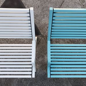 High angle view of wooden chairs