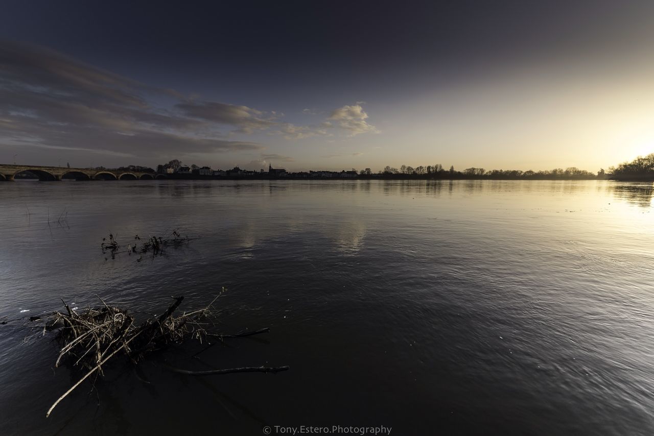 water, sky, sunset, waterfront, reflection, tranquil scene, scenics, tranquility, lake, beauty in nature, sun, nature, river, rippled, sunlight, silhouette, cloud - sky, sea, idyllic, outdoors