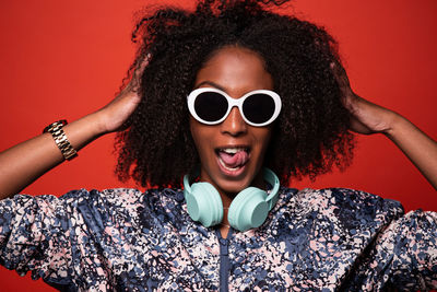 Portrait of young woman wearing sunglasses