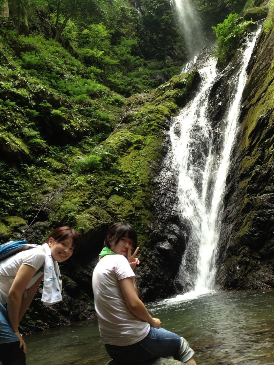 waterfall, water, motion, lifestyles, leisure activity, flowing water, forest, flowing, nature, men, tree, beauty in nature, long exposure, casual clothing, rock - object, rear view, vacations, scenics