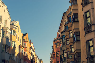 Low angle view of buildings against clear sky