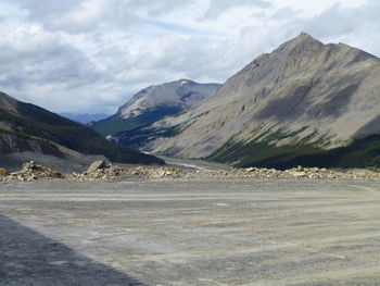 Scenic view of landscape and mountains against sky