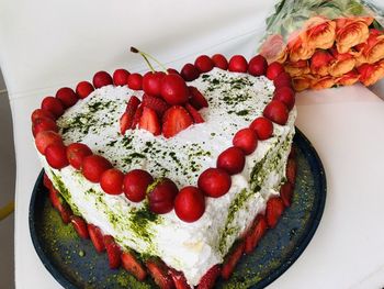 High angle view of strawberries in plate