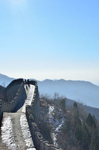 Scenic view of great wall of china and mountains