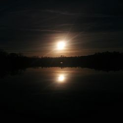 Scenic view of sunset over river