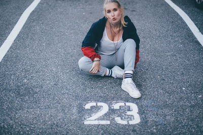 Portrait of woman on road