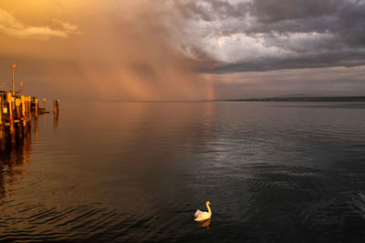 Scenic view of sea against sky during sunset