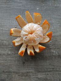 High angle view of orange flowers on table