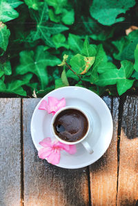 High angle view of coffee cup on table