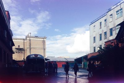 Buildings in city against sky