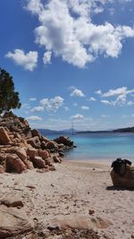Scenic view of sea against cloudy sky