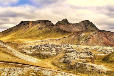 Scenic view of mountain range against sky