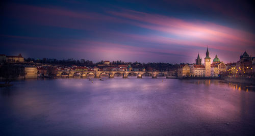 City lit up at dusk