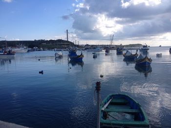 Boats moored in sea