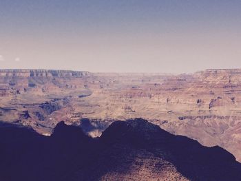 Scenic view of dramatic landscape against clear sky